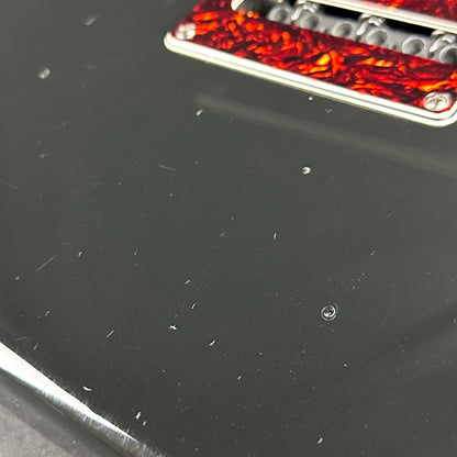 Damage on back of body of Used 1996 Tom Anderson Classic S Black.