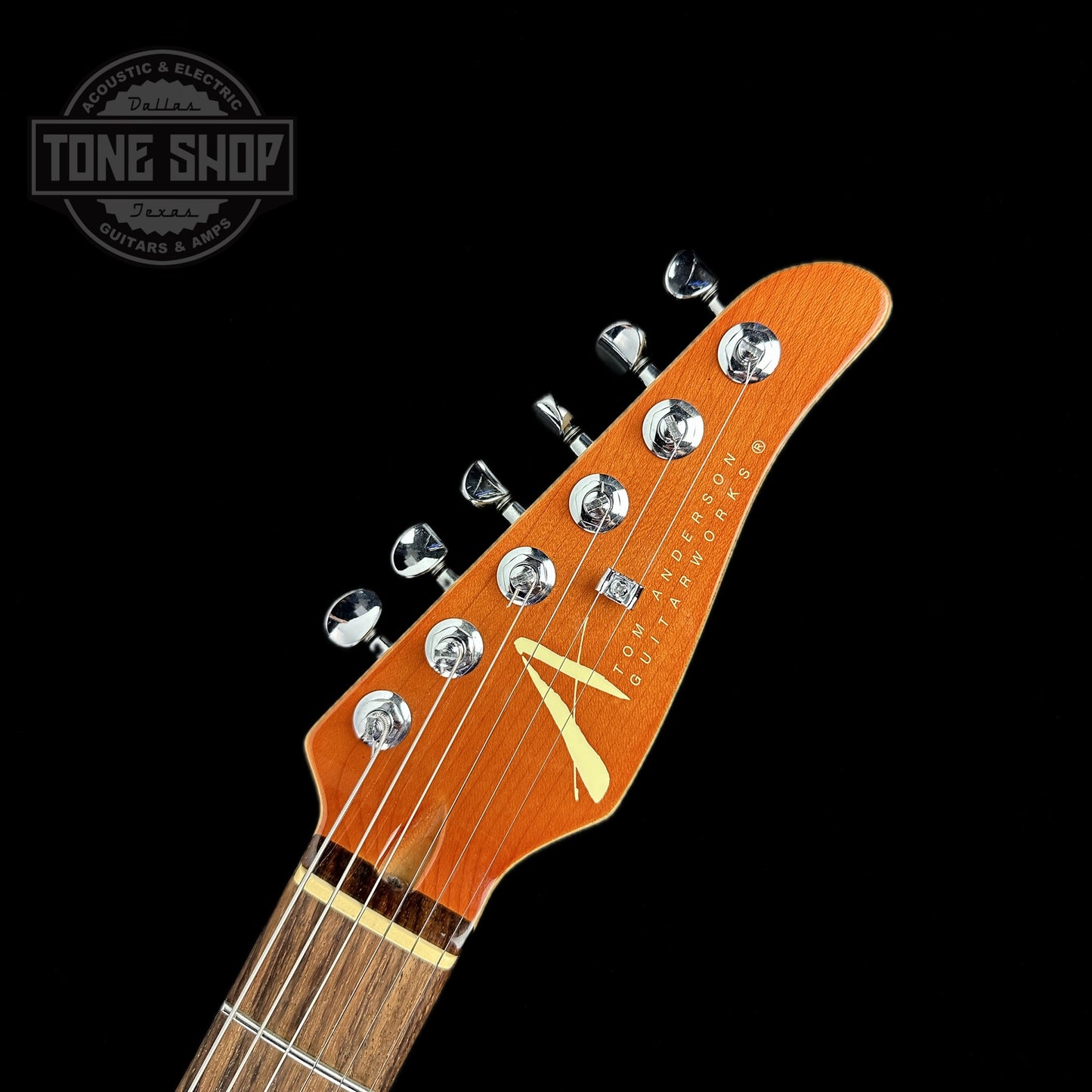 Front of headstock of Used 2008 Tom Anderson Drop Top Classic Natural Honey Burst.