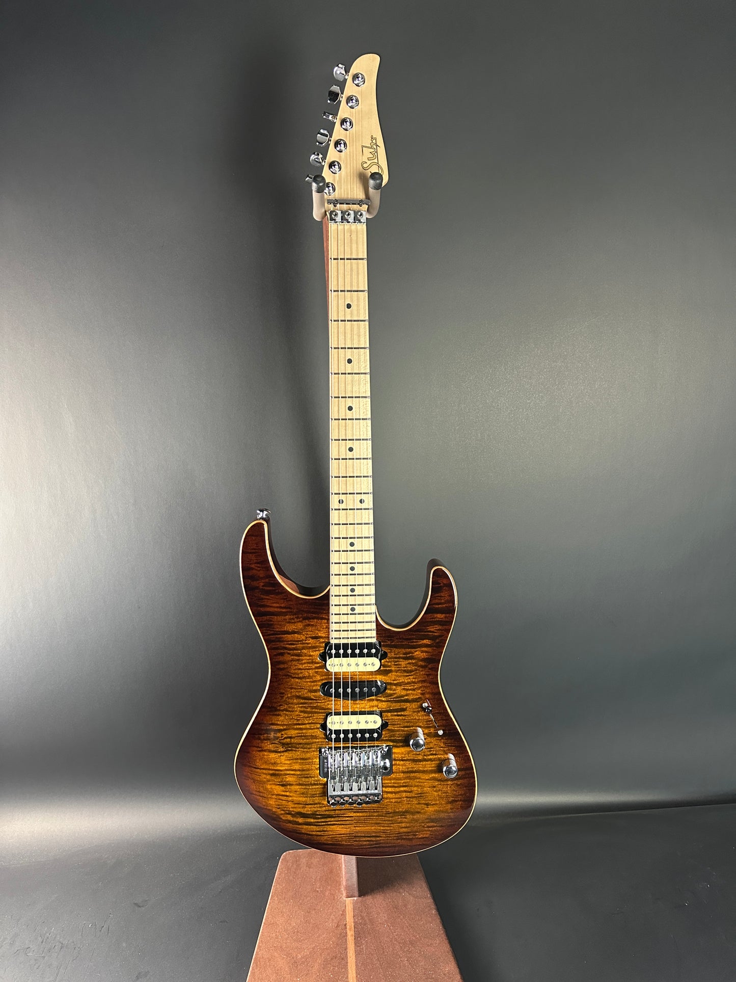 Full front of Used 2015 Suhr Modern Pro Flame Top HSH Floyd Rose.