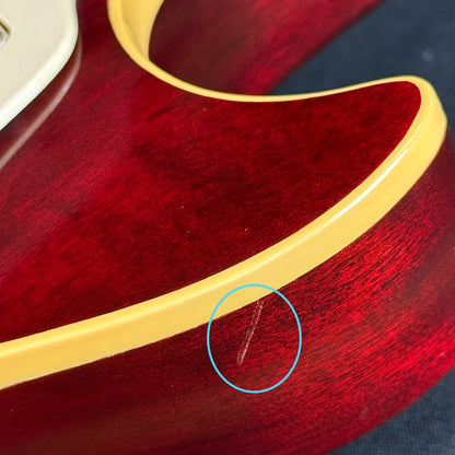 Scratch on upper horn of Vintage 1977 Gibson Les Paul Standard Wine Red.