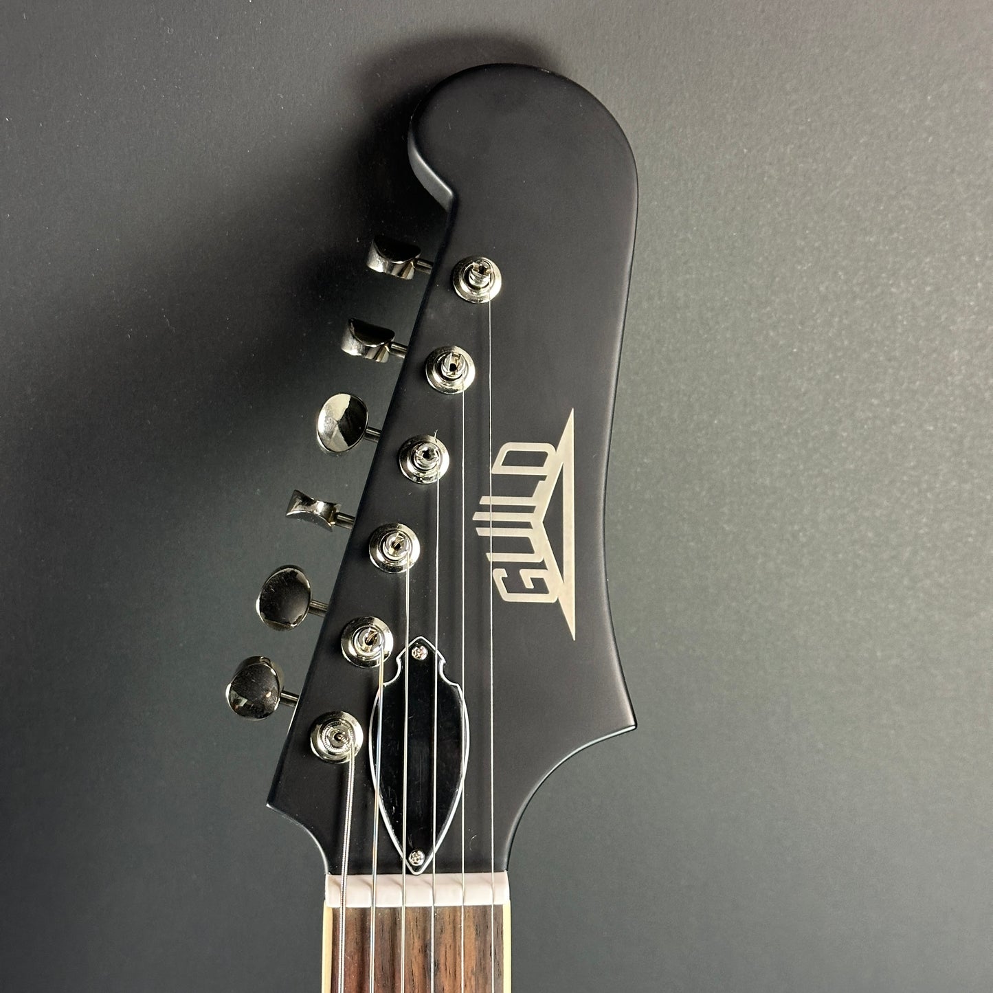 Front of headstock of Used Guild Starfire I Jet P90 Black.