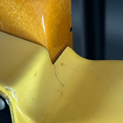 Damage near neck joint of Vintage 1968 Fender Telecaster Vintage White.