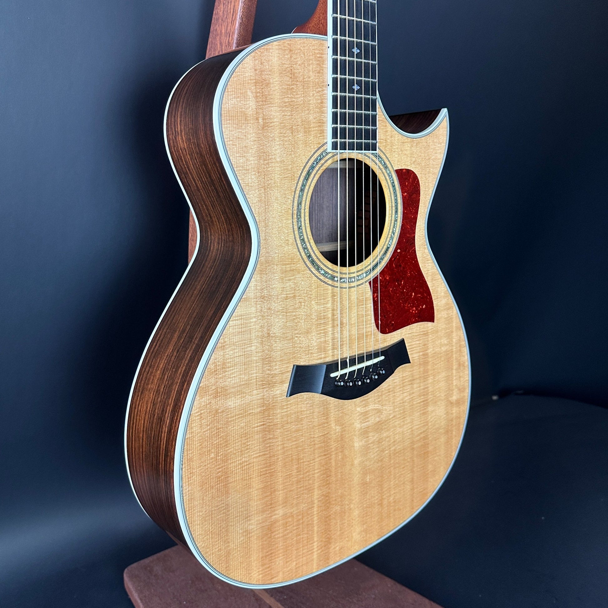 Front angle of Used 1992 Taylor 812c Florentine Cutaway.