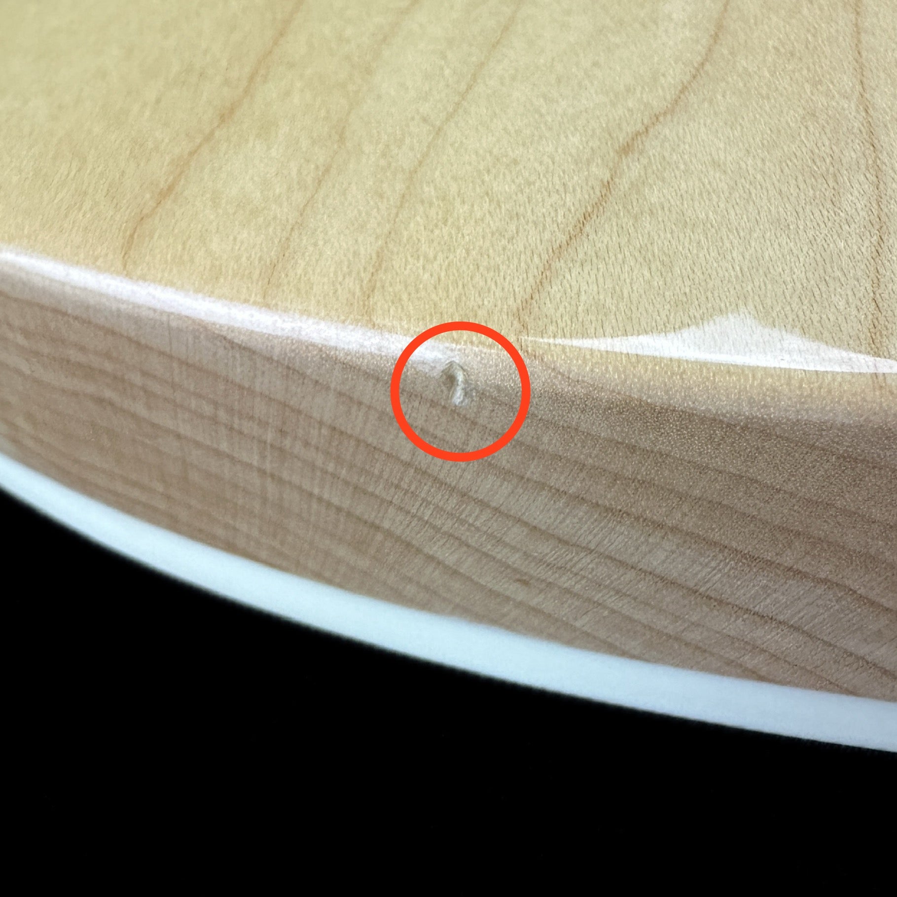 Small ding on bottom edge of Used 2013 Rickenbacker 4003 Maple Glow Bass.