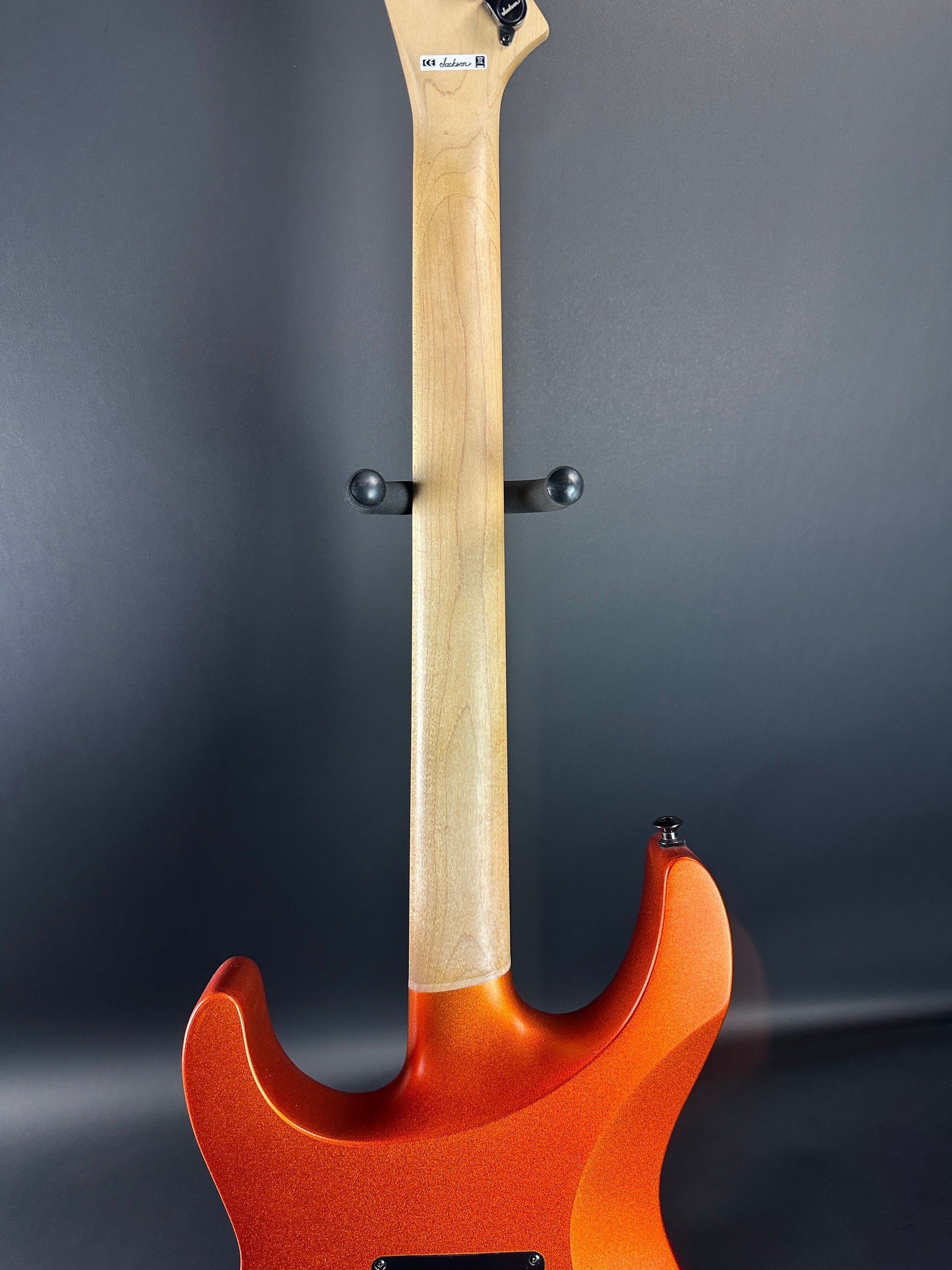 Back of neck of Used Jackson Pro Series Soloist SL3 Satin Orange Blaze.