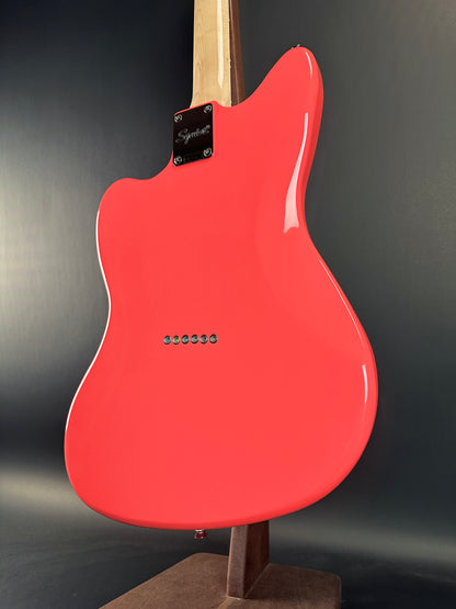 Back angle of Used Squier Paranormal Jazzmaster XII Fiesta Red.