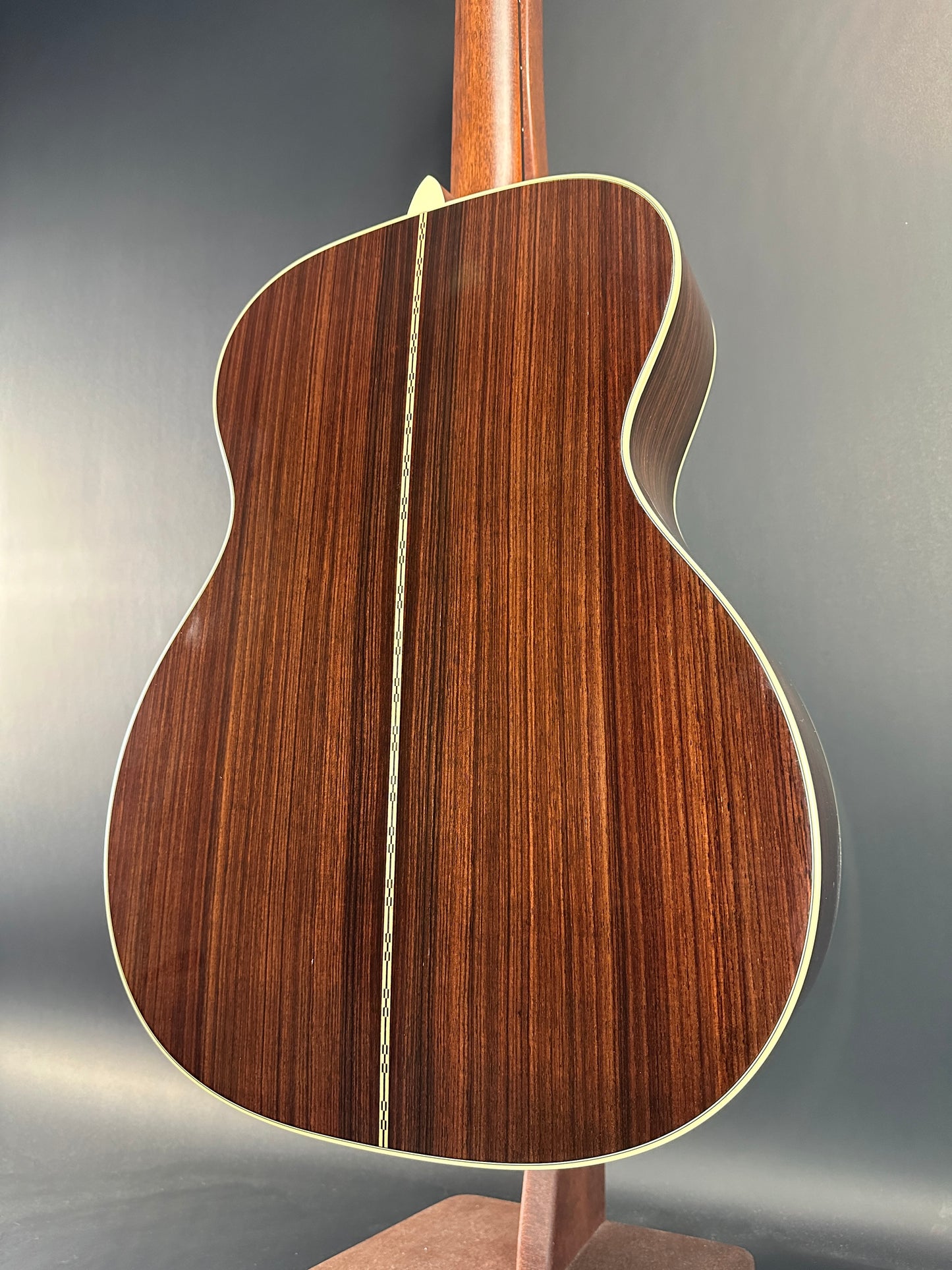 Back angle of Used Martin OM-28 Natural.