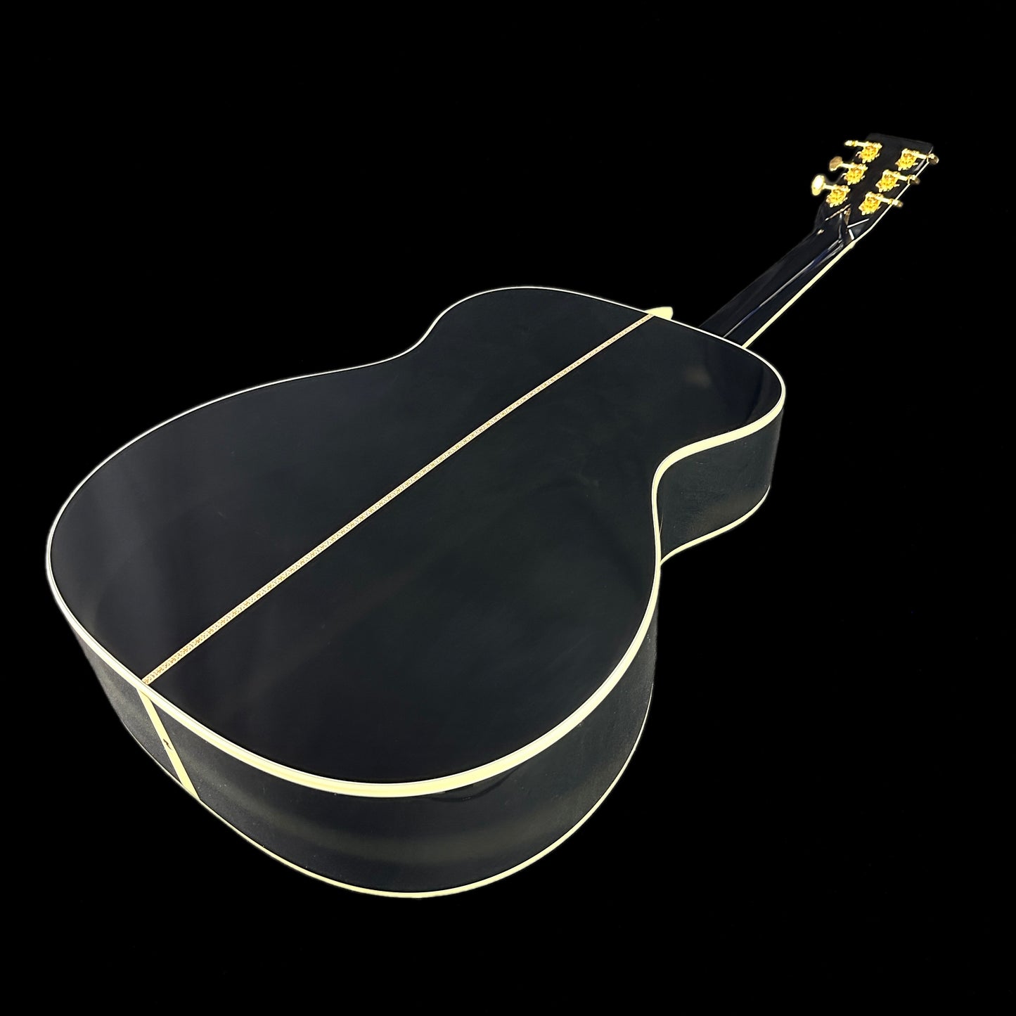 Back angle of Martin Custom Shop OM-42 Black Sitka/EIR.