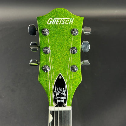 Front of headstock of Used Gretsch G6120T Brian Setzer Signature Hot Rod Extreme Coolant Green.