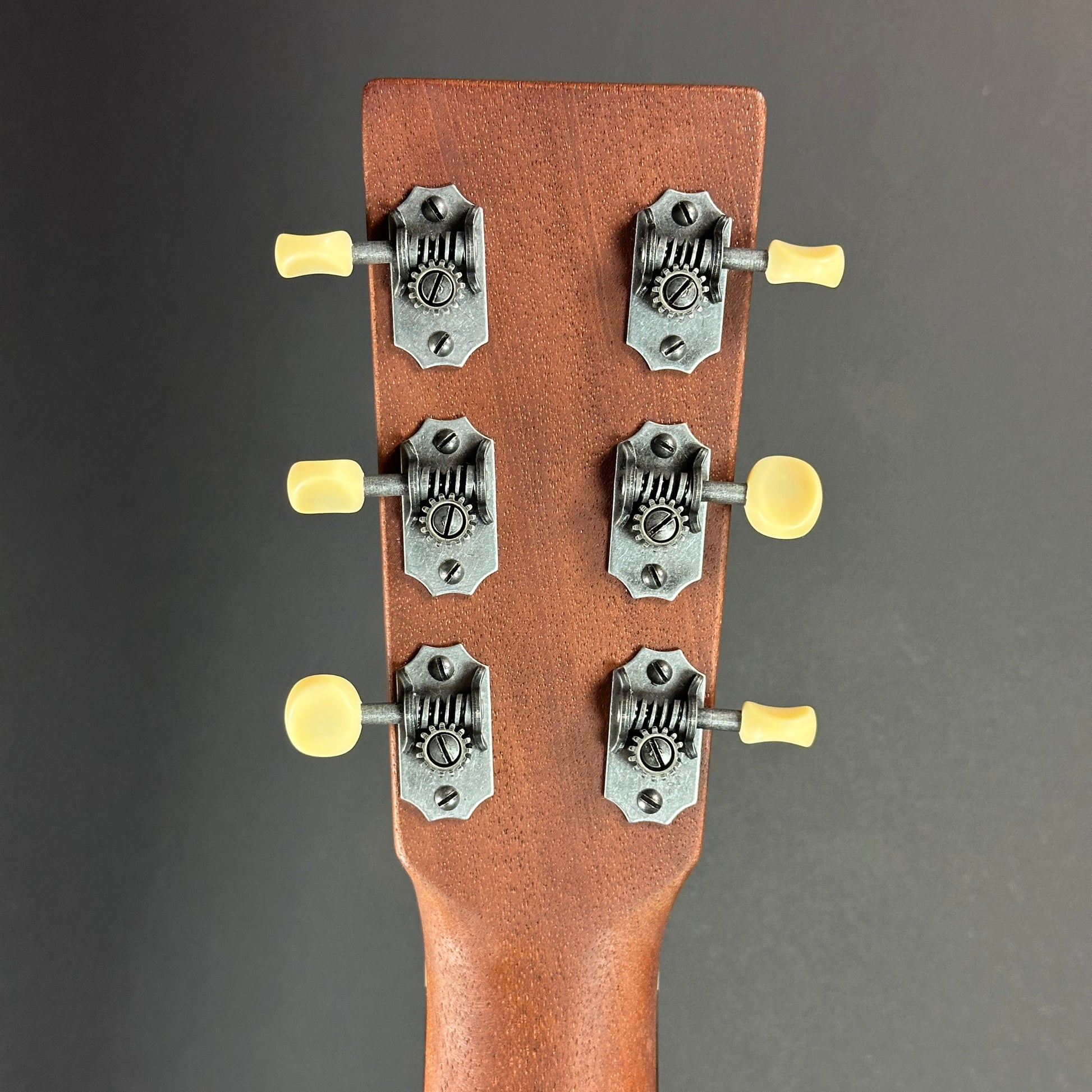 Back of headstock of Used Martin 000-17 Whiskey Sunset.