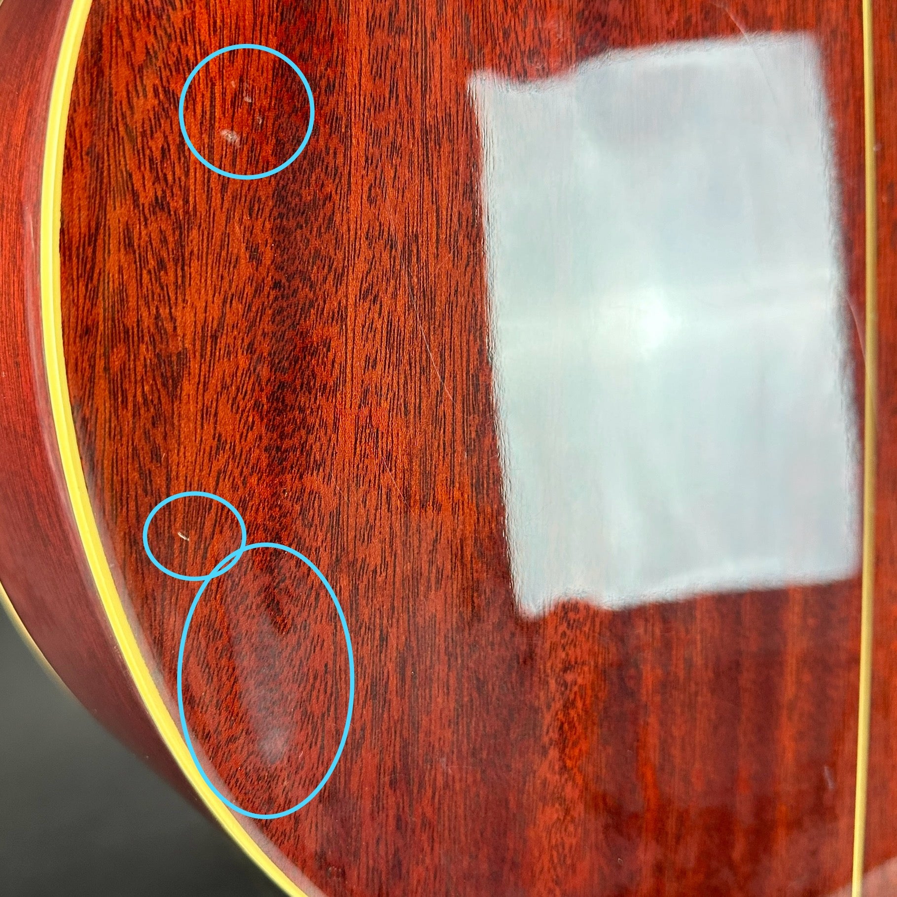 Marks on back of Used Takamine Santa Fe ESF40C.