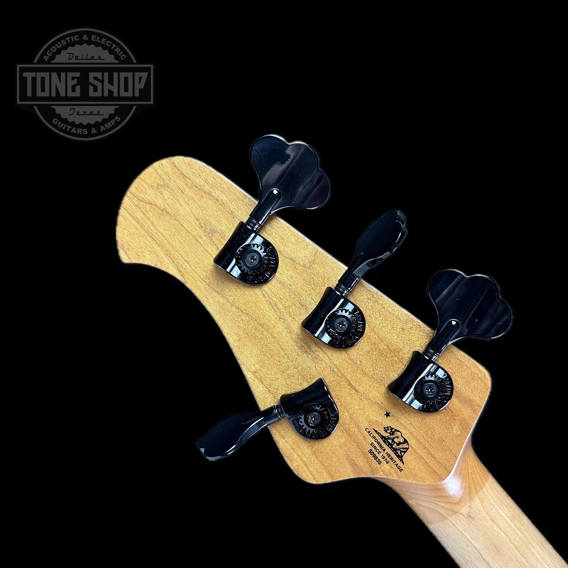 Back of headstock of Used Ernie Ball Musicman DarkRay 4 Obsidian.