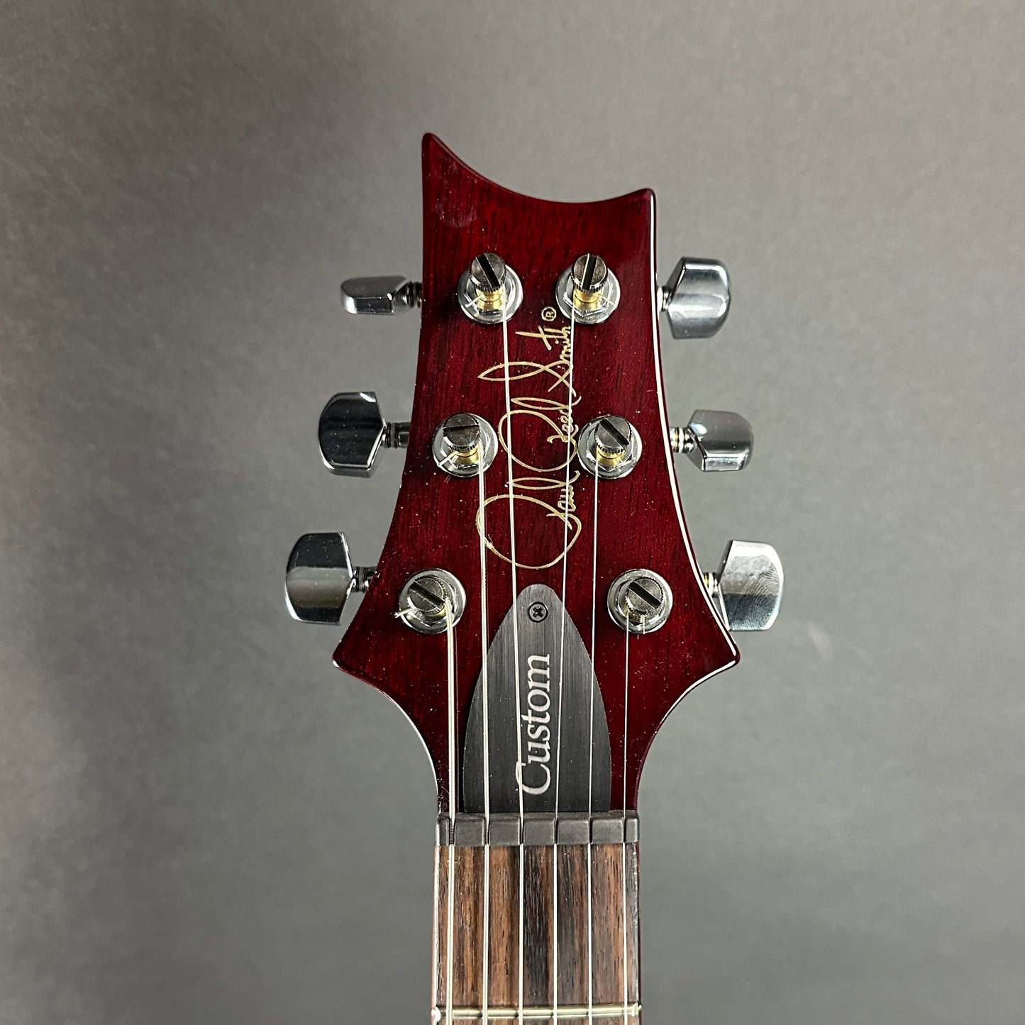 Front of headstock of Used PRS Paul Reed Smith S2 Custom 24 Fire Red Burst.