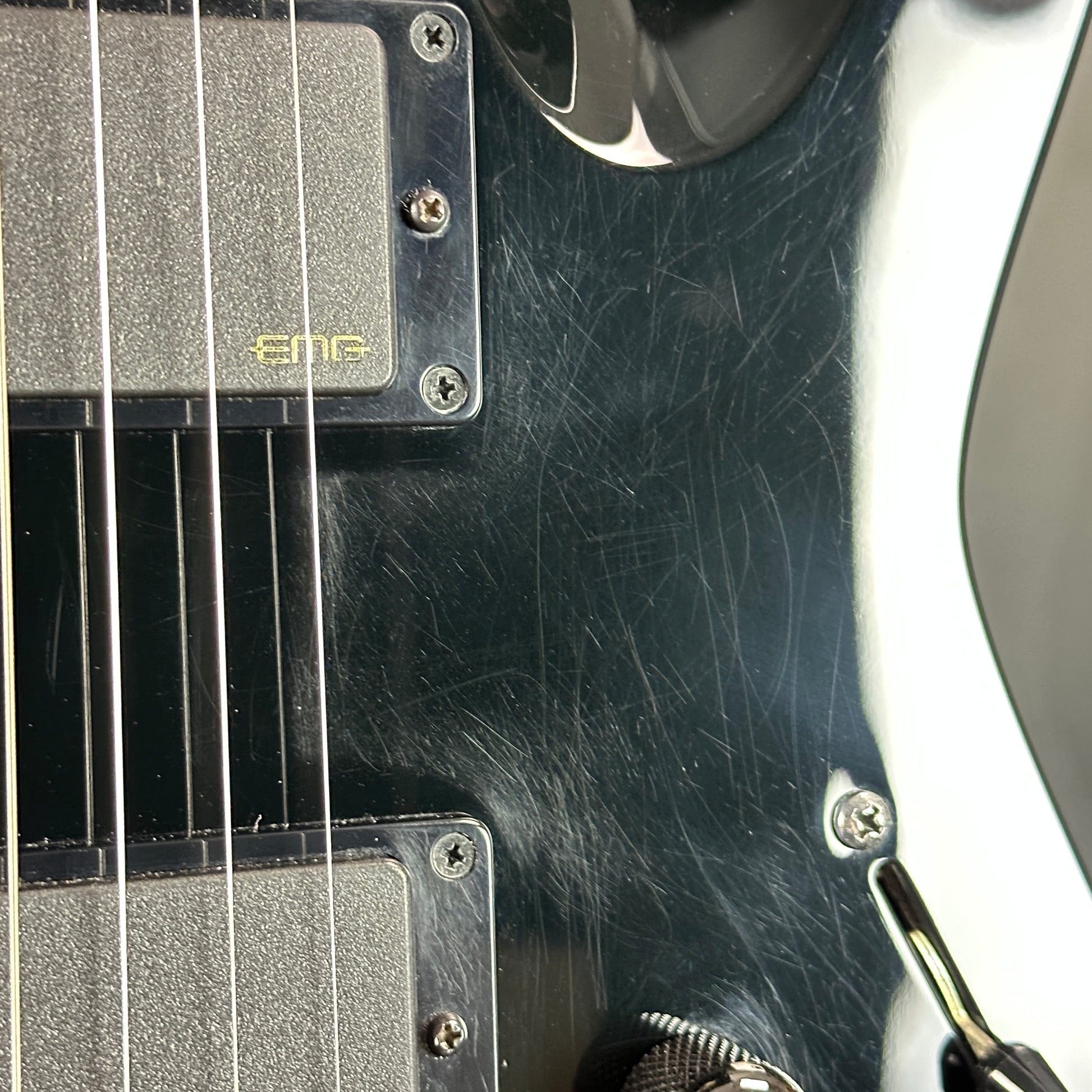 Scratches on body of Used ESP M-11 Custom Black.