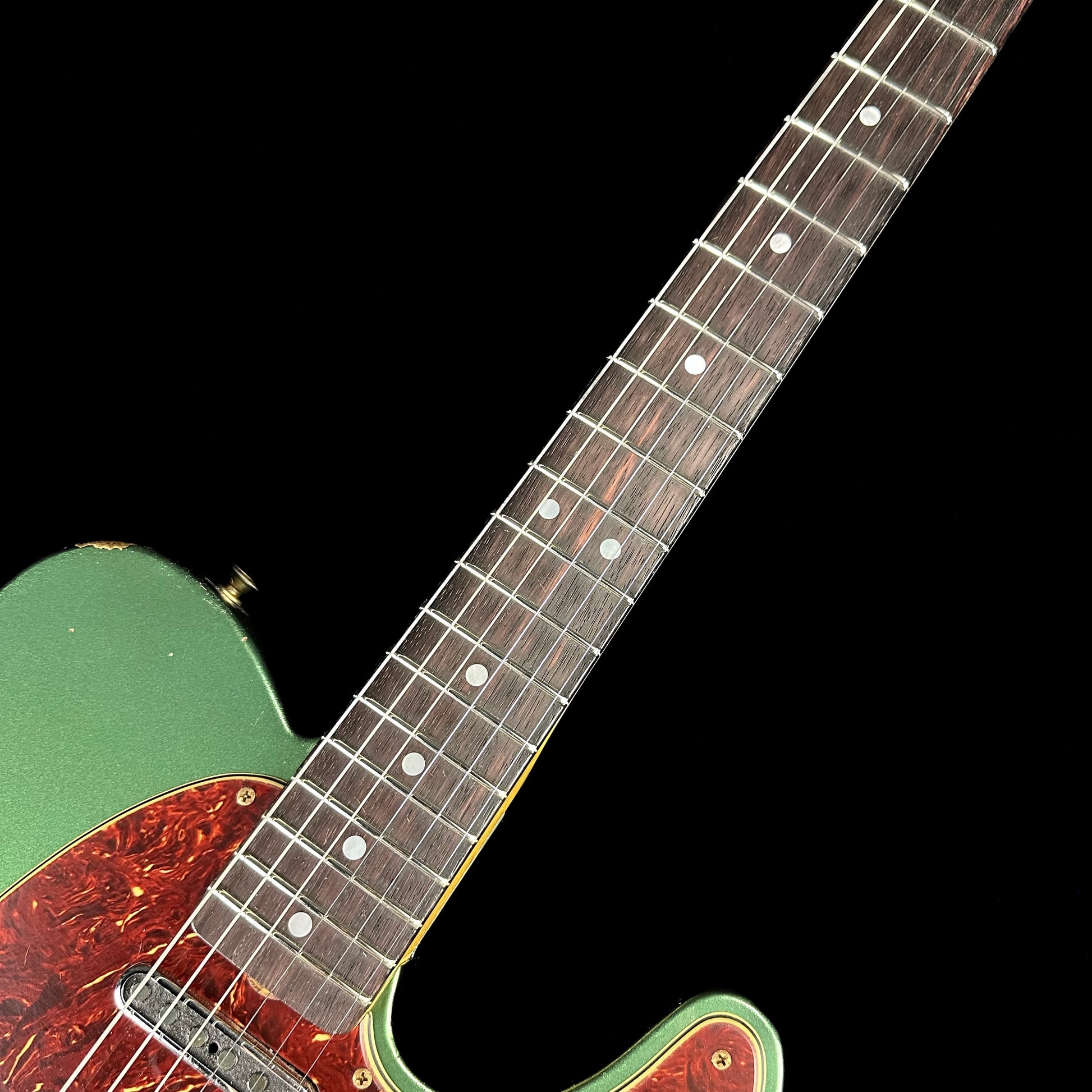 Fretboard of Fender Custom Shop Limited Edition '64 Tele Relic Aged Sherwood Green Metallic.