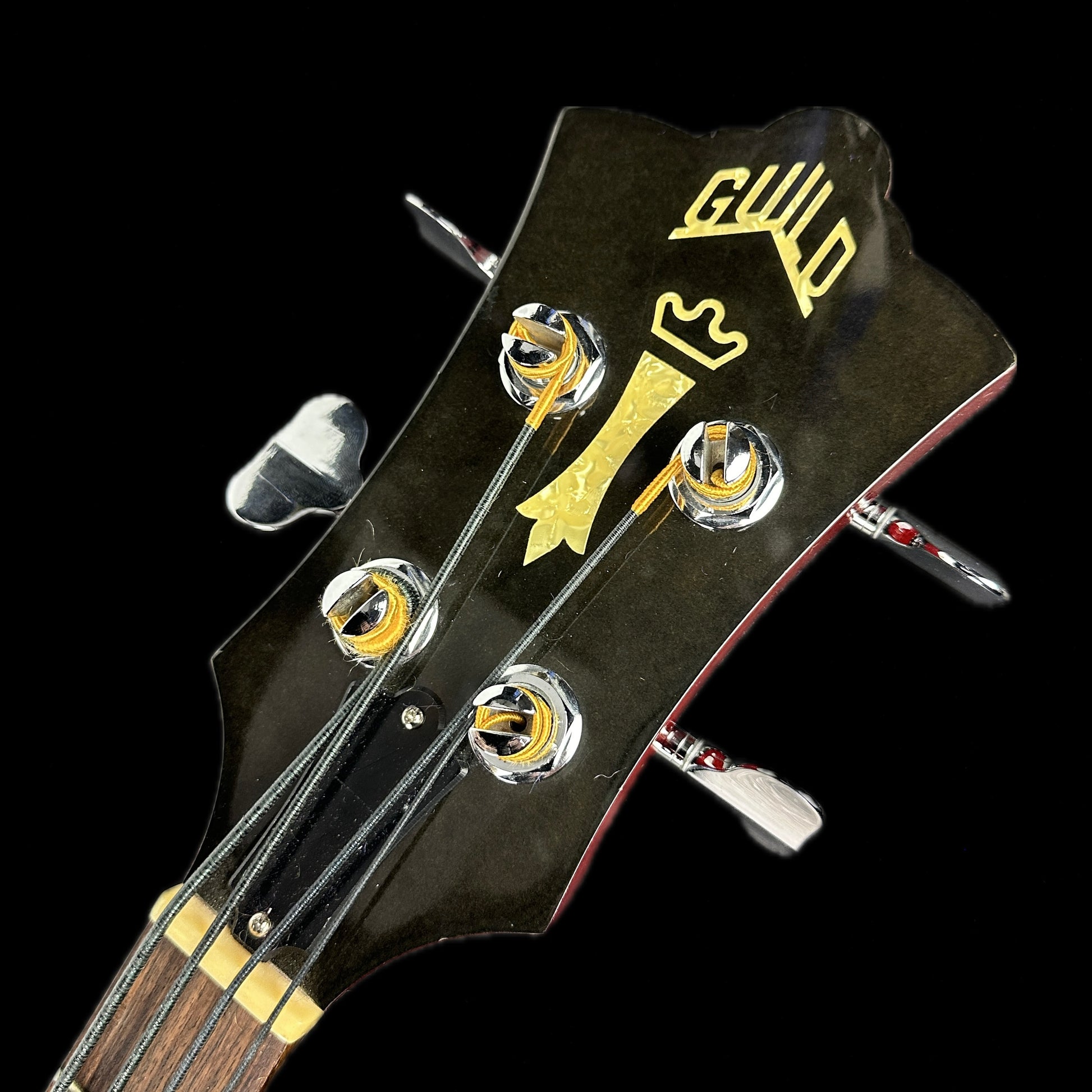 Front of headstock of Used Guild Starfire II Cherry.