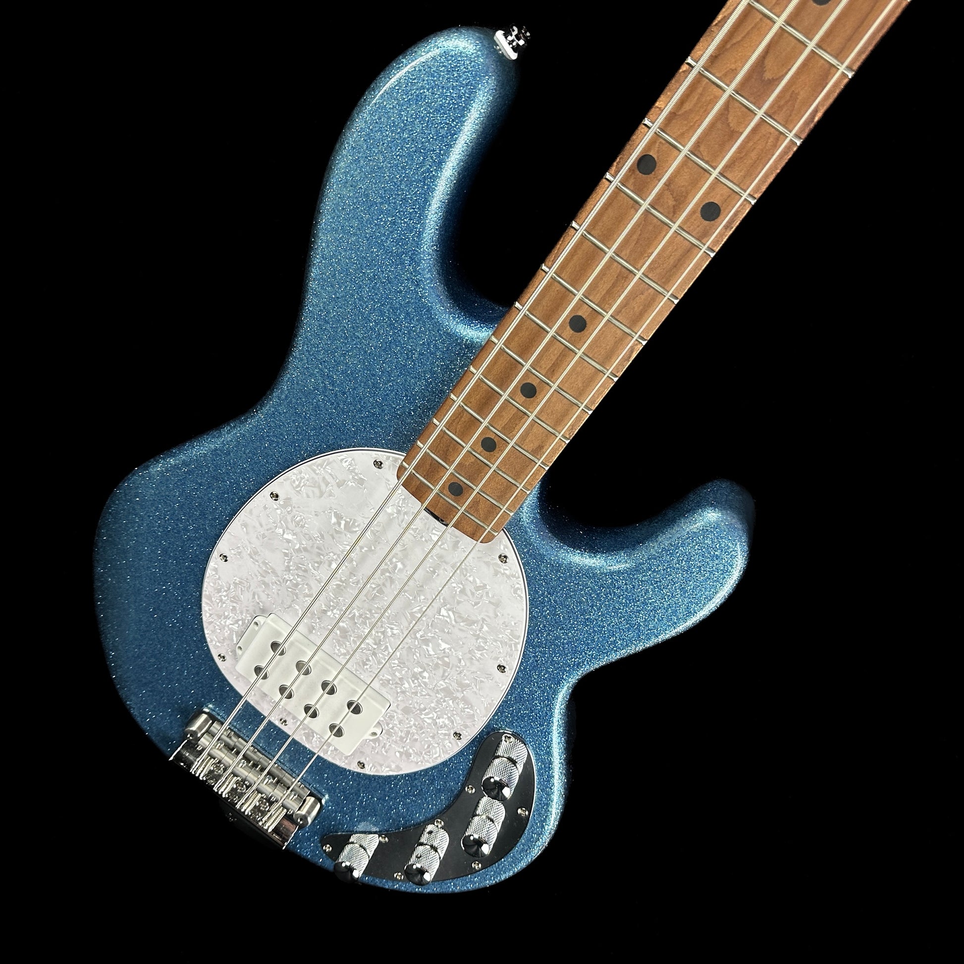 Front angle of Used Sterling Ray 34 Bass Blue Sparkle.