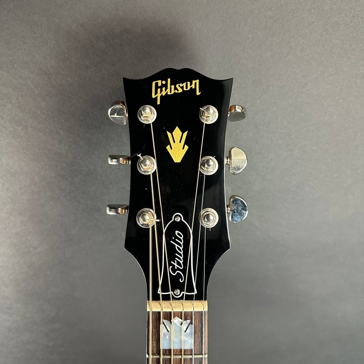 Front of headstock of Used Gibson SJ-200 Studio Rosewood.