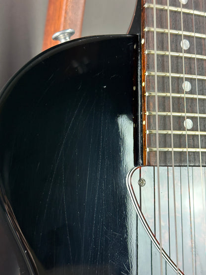 Scratches on body of Used Gibson Les Paul Junior Ebony.