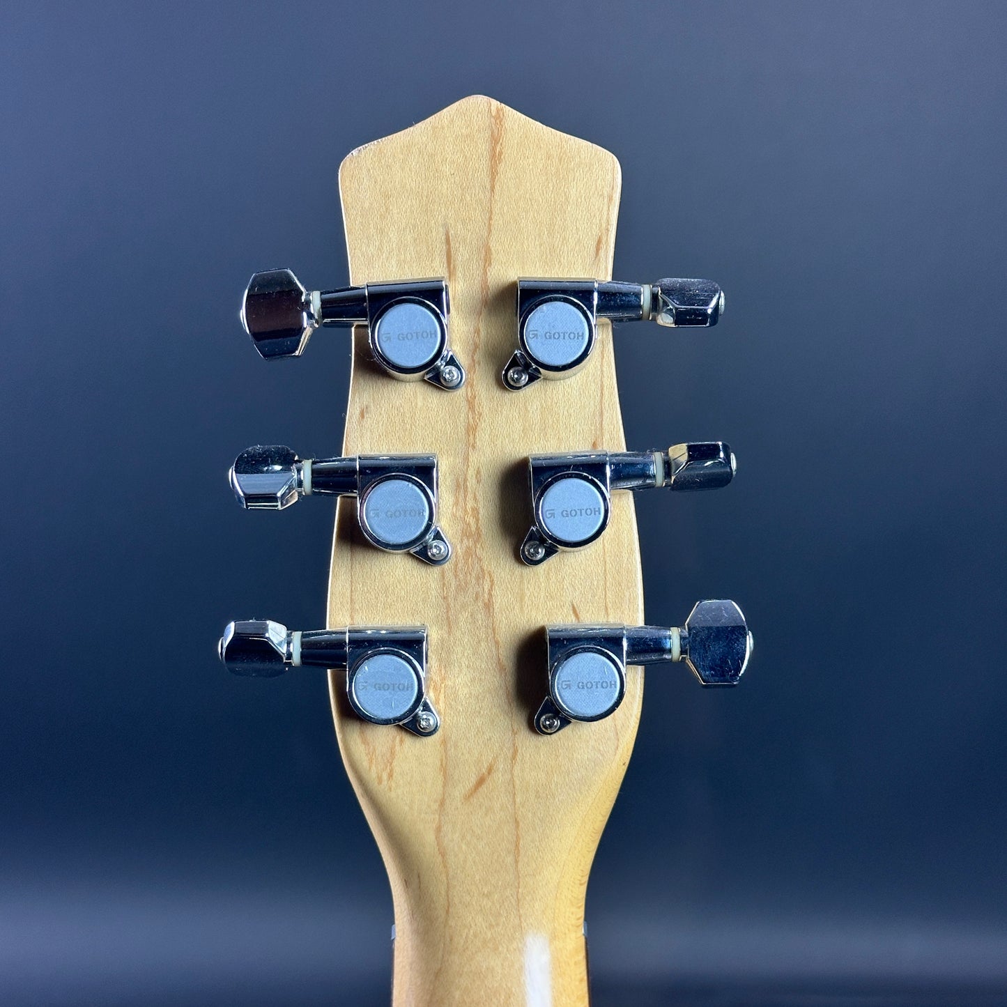 Back of headstock of Used Danelectro '56 U3 Green Sparkle.