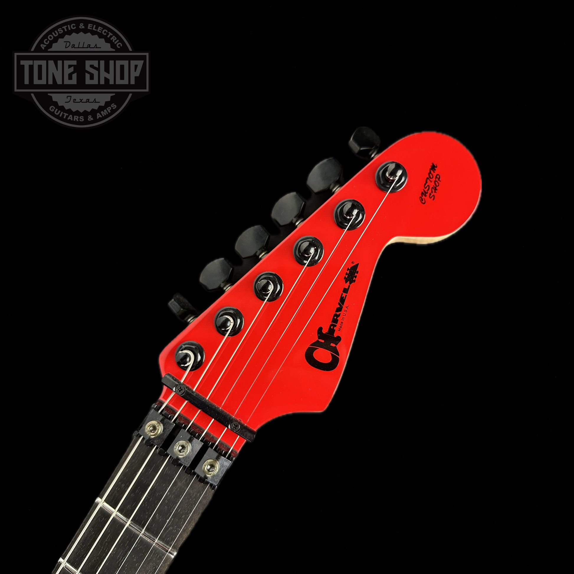 Front of headstock of Charvel Custom Shop San Dimas2H F R Ferrari Red.