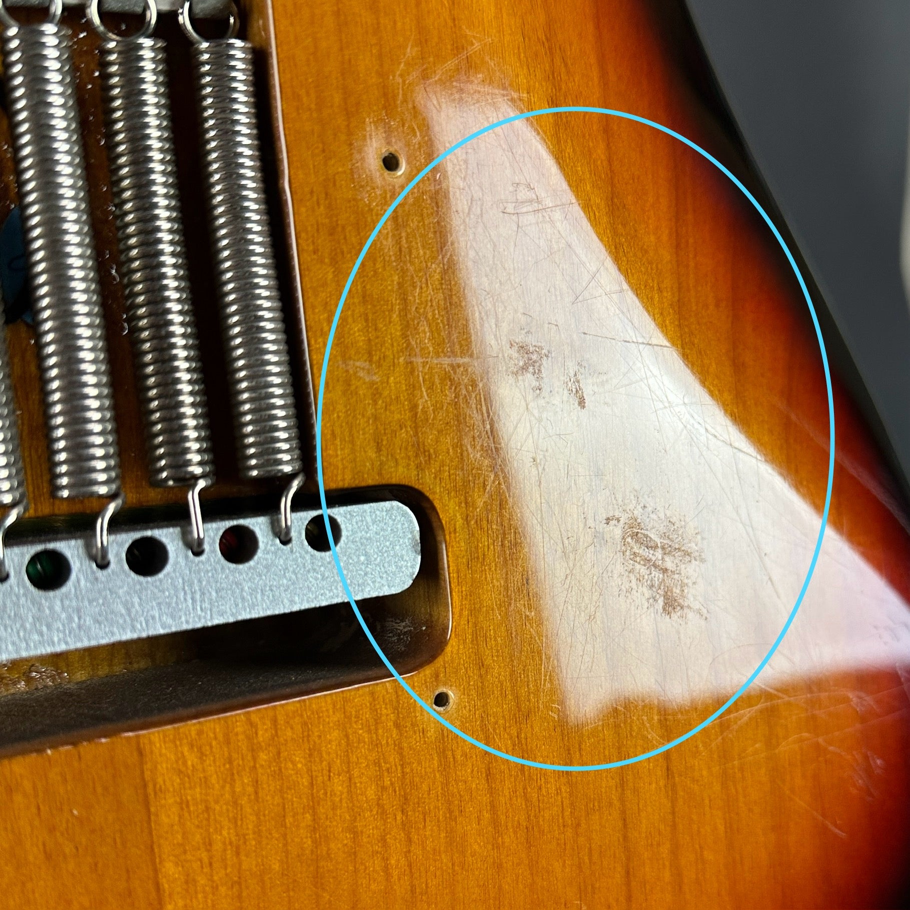 Scratches on back of Used 1994 Fender SRV Strat.