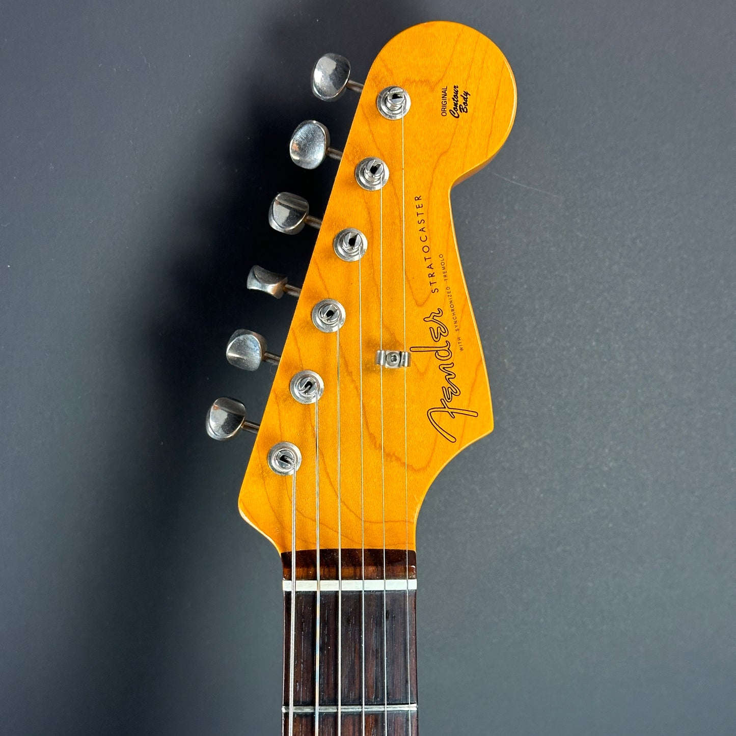 Front of headstock of Used Fender Classic Series '60s Stratocaster 3 Tone Sunburst.