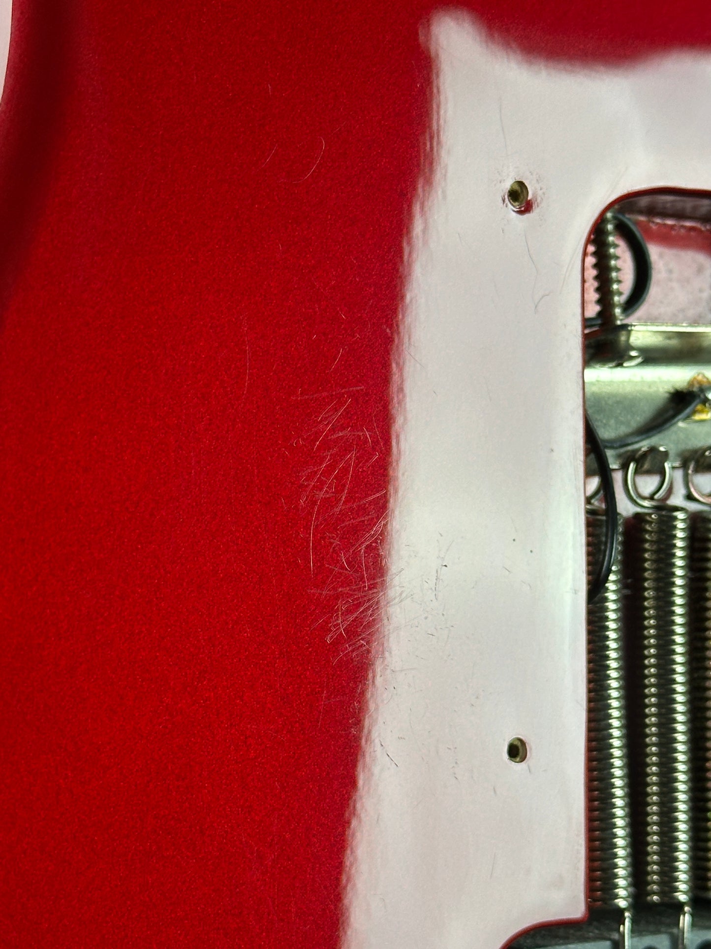 Scratches on back of Used 2006 Fender Sam Ash 48th Street Red Strat.