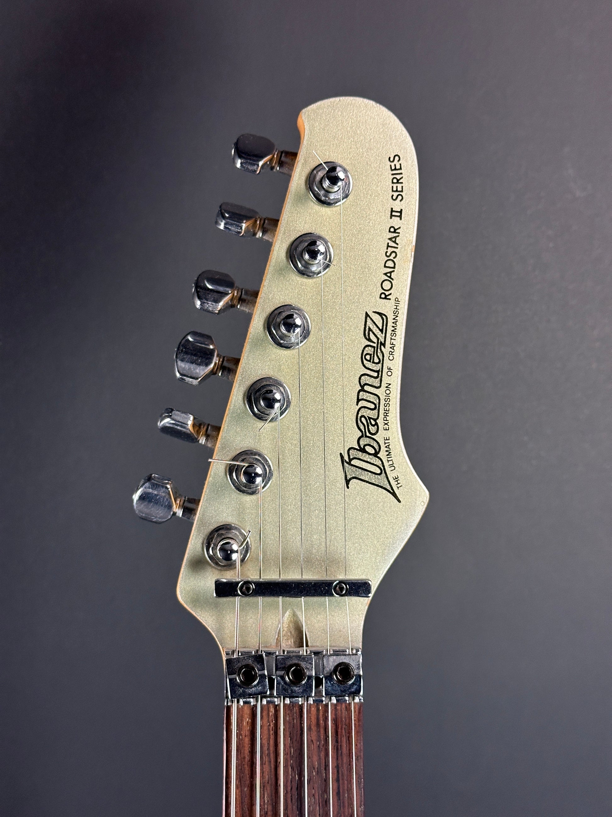 Front of headstock of Used 1984 Ibanez Roadstar II HSH.