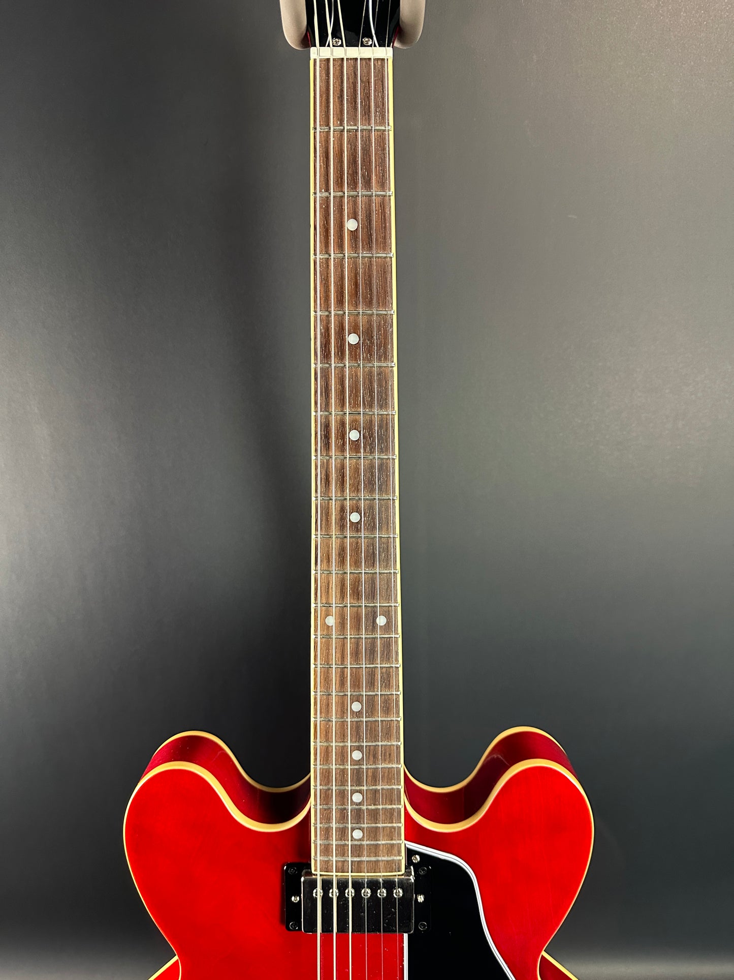 Fretboard of Used Epiphone 335 IG Cherry Red.