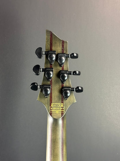 Back of headstock of Used Schecter C1 Apocalypse Ash Green Sustainer.