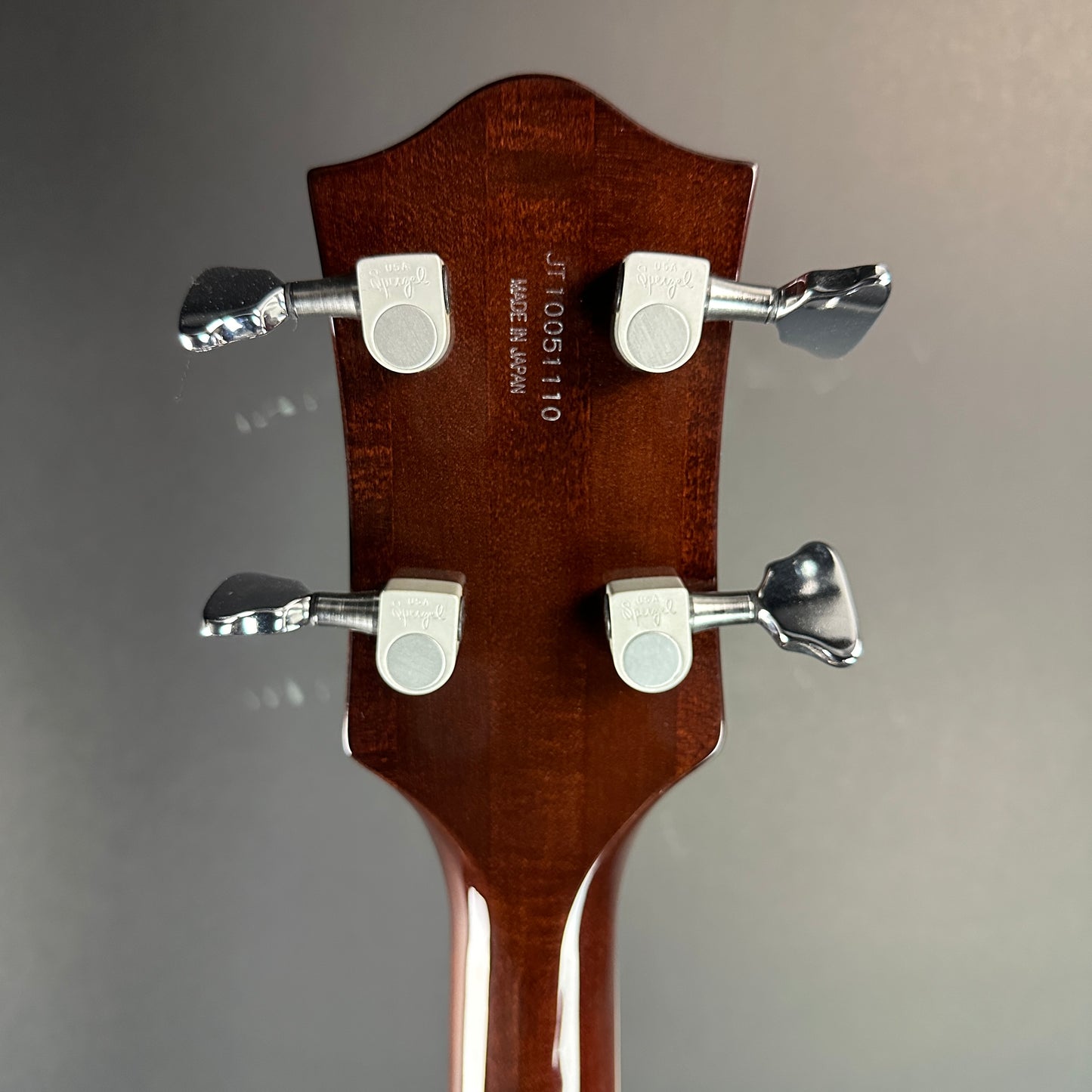 Back of headstock of Used Gretsch G6119B Walnut Broadcaster Bass.