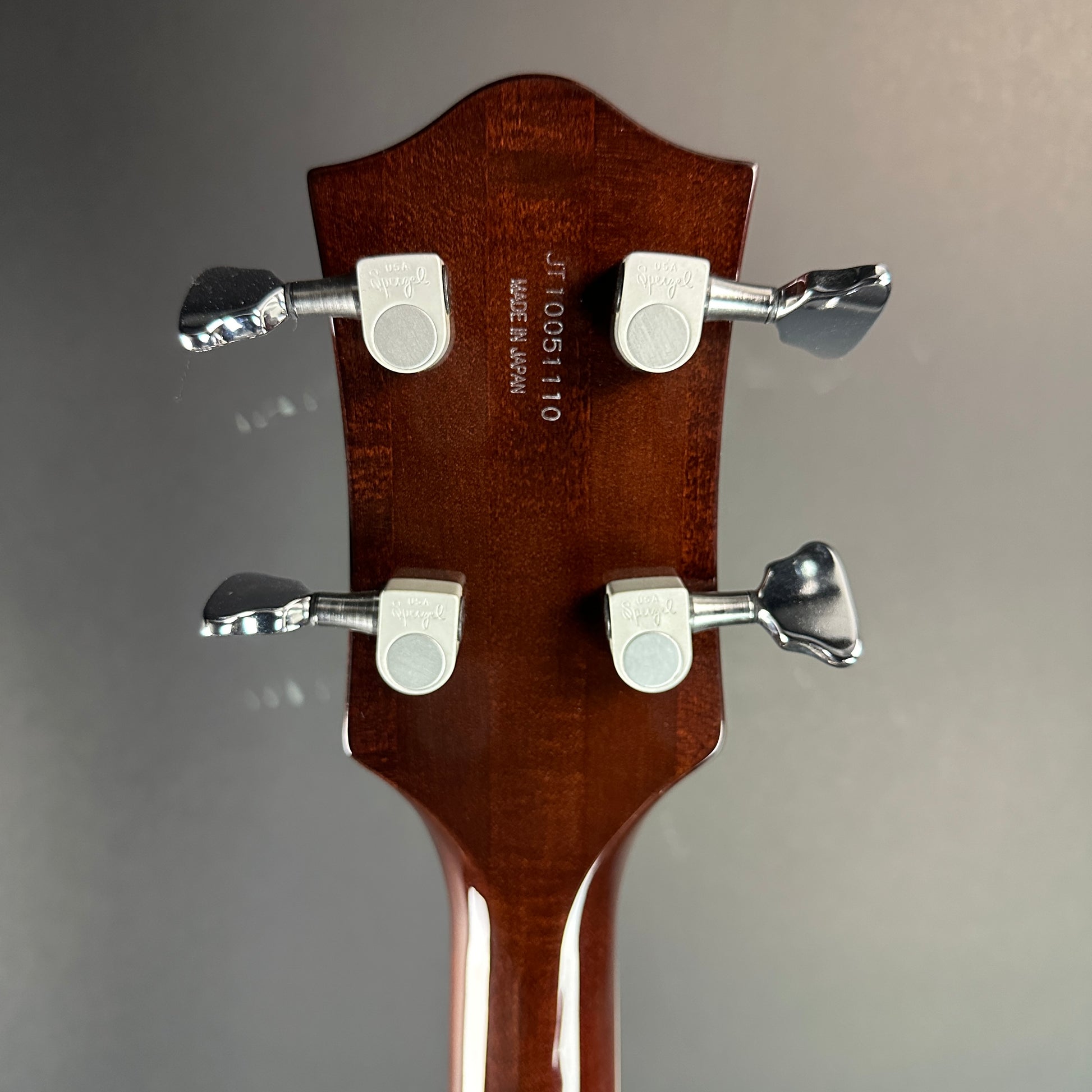 Back of headstock of Used Gretsch G6119B Walnut Broadcaster Bass.