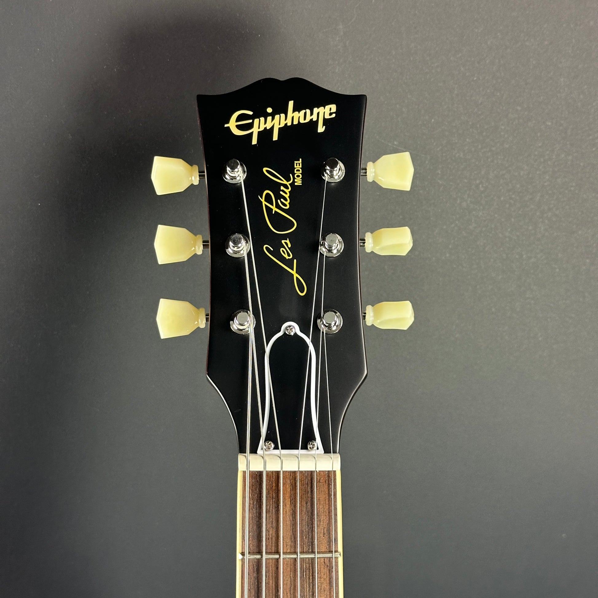 Front of headstock of Used Epiphone Inspired by Gibson Custom 1959 Les Paul Standard Tobacco Sunburst.