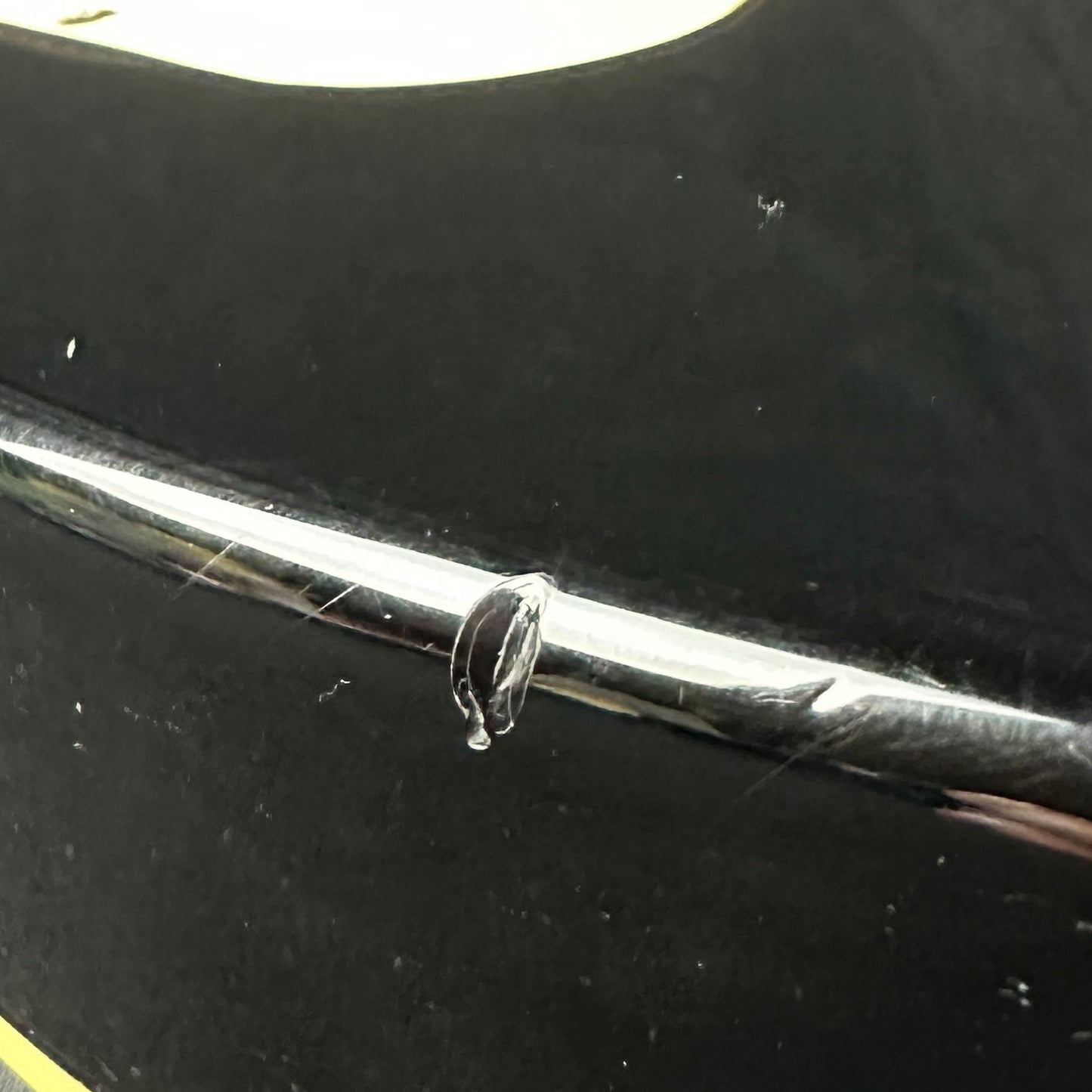 Ding on bottom edge of Used Epiphone Les Paul Standard Ebony.