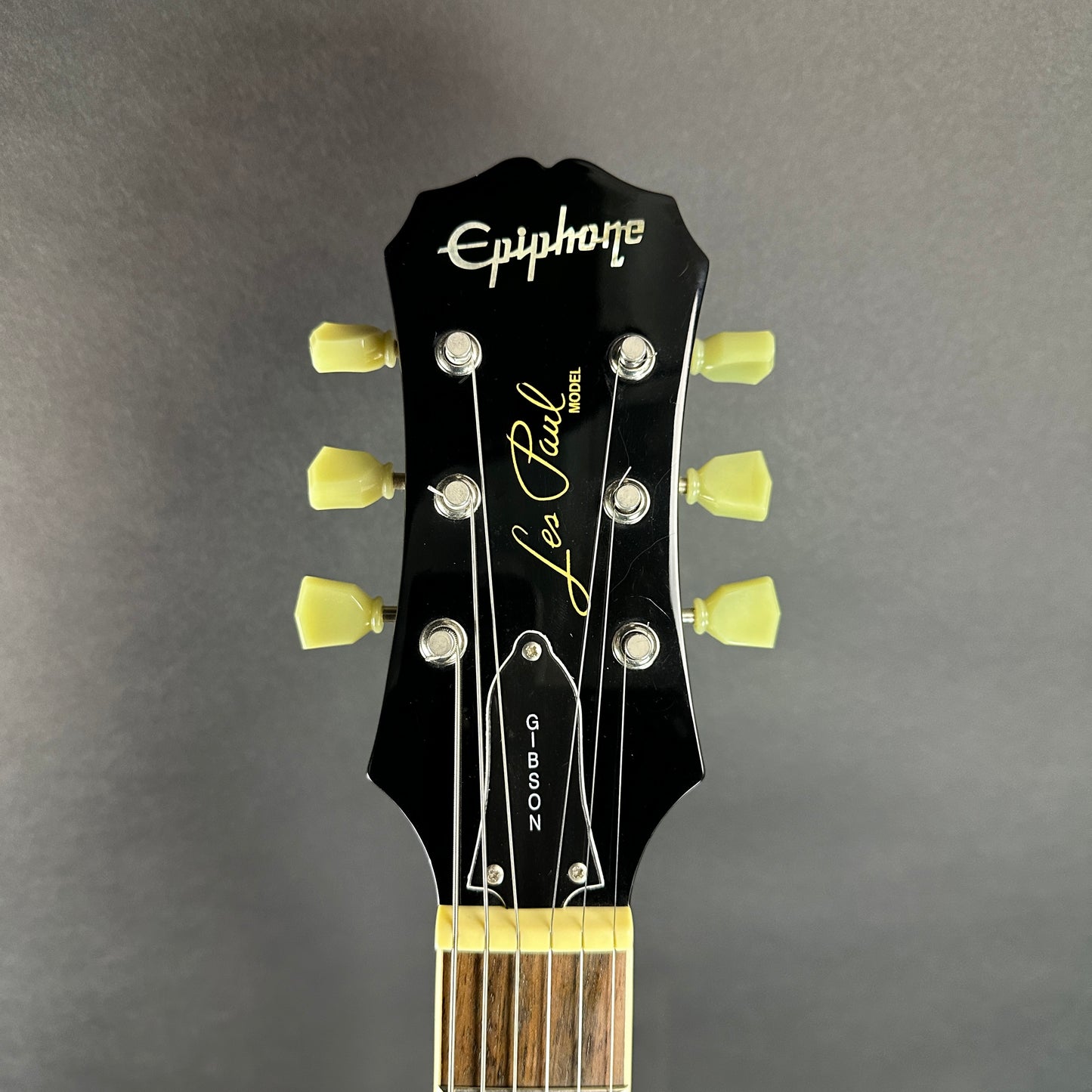 Front of headstock of Used Epiphone Les Paul Standard.