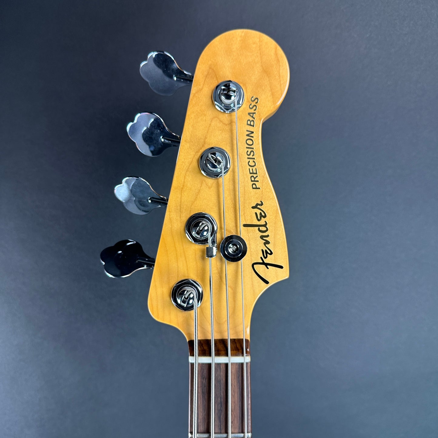 Front of headstock of Used Fender Ultra Precision Bass Ultraburst.