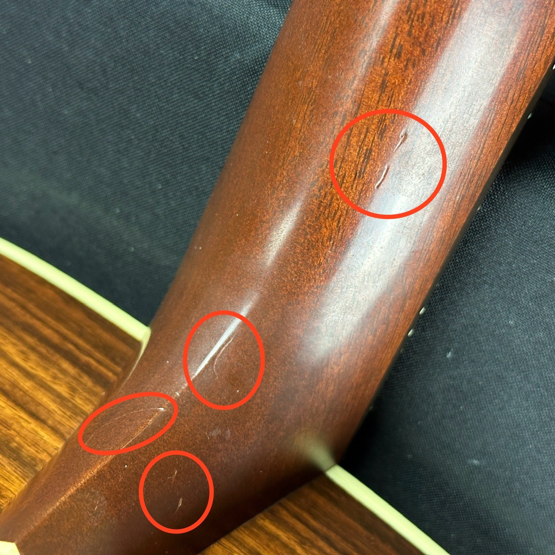 Small dings on neck of Used Martin HD-28V.