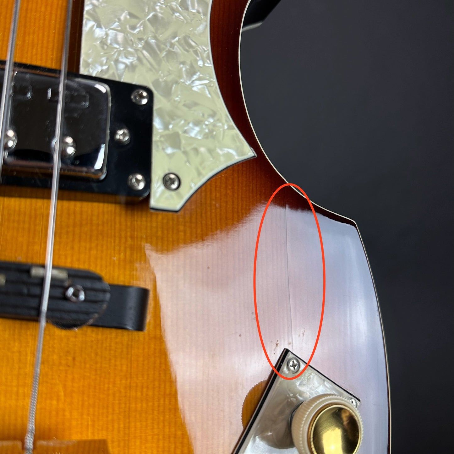 Crack near controls of Used Hofner Icon Sieries D-Bass Sunburst.