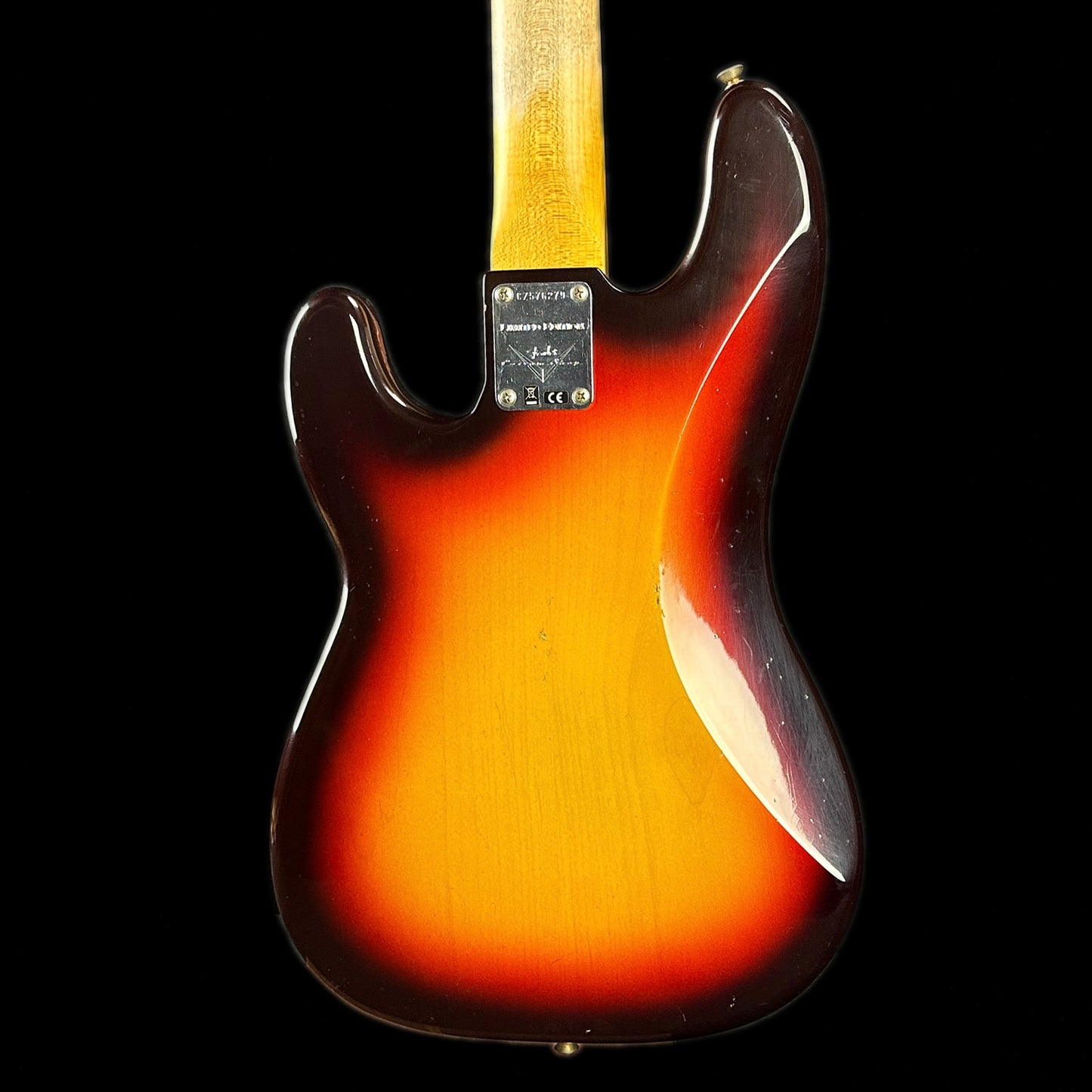 Back of body of Fender Custom Shop Limited Edition '59 Precision Bass Journeyman Relic Chocolate 3 Color Sunburst.