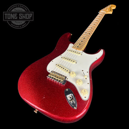 Front angle of Fender Custom Shop Limited Edition 69 Strat Journeyman Relic Aged Red Sparkle.