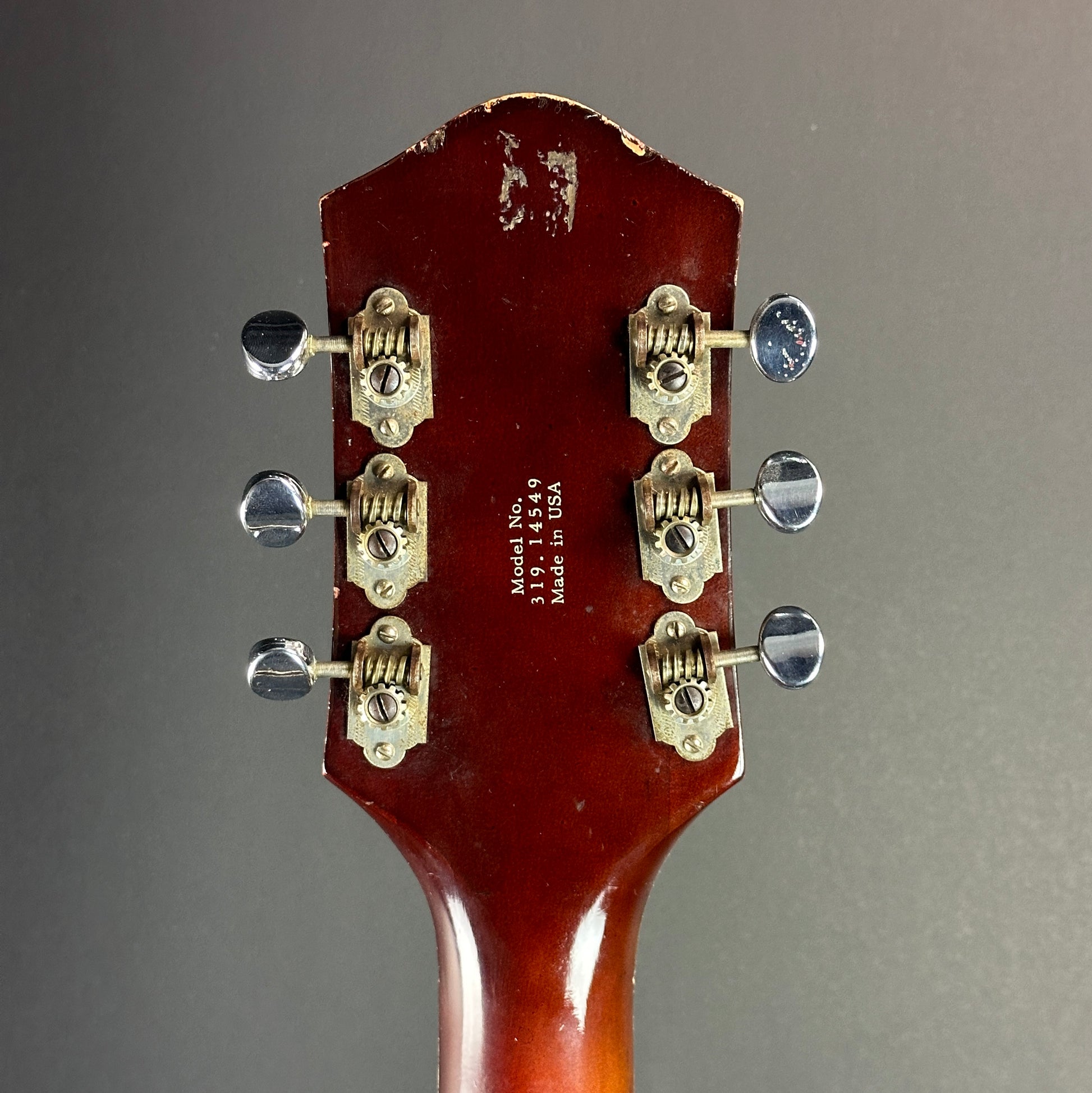 Back of headstock of Vintage Silvertone 1454 Doublecut Redburst.