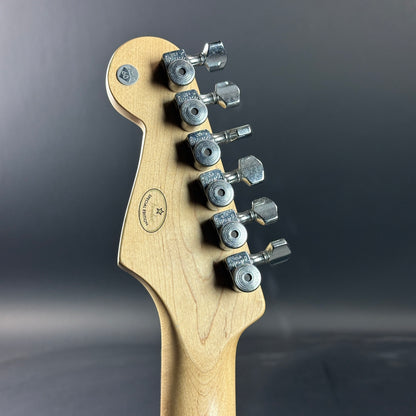 Back of headstock of Used 2006 Fender Sam Ash 48th Street Red Strat.