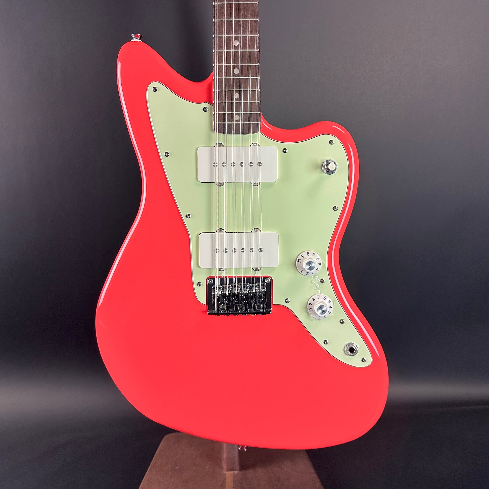 Front of Used Squier Paranormal Jazzmaster XII Fiesta Red.