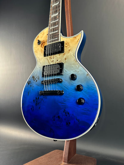 Front angle of Used ESP LTD EC-1000 Deluxe Blue Nat Fade.