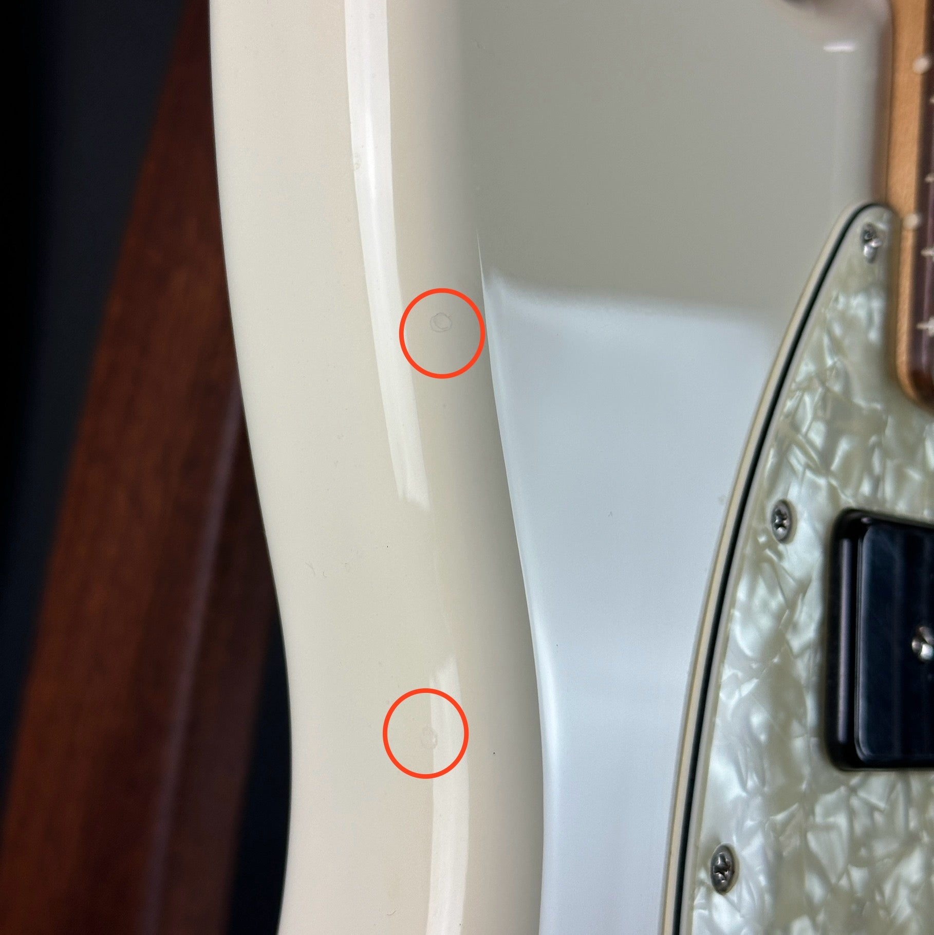 Dings on side edge of Used Fender Player Mustang 90 White.