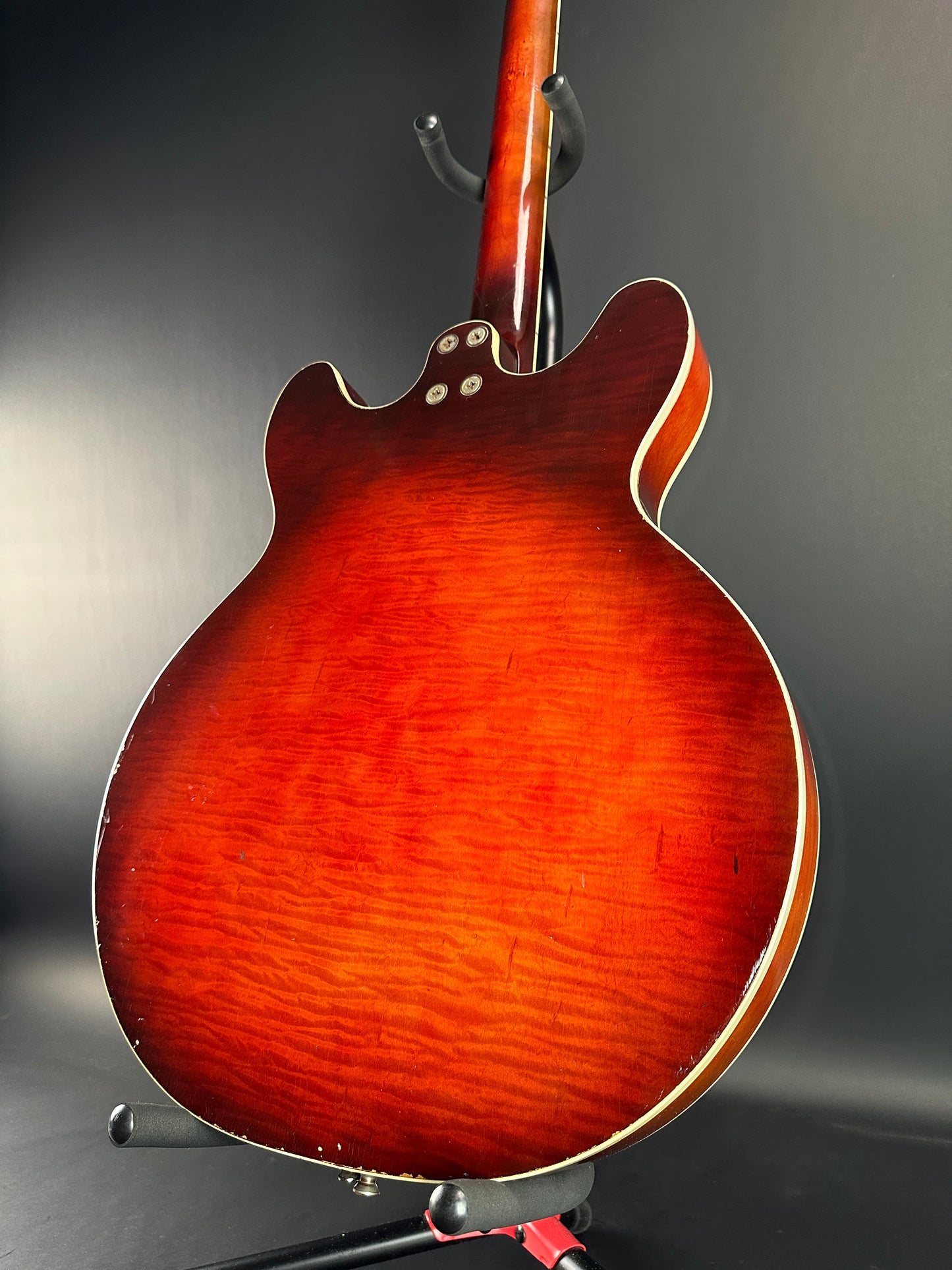 Back angle of Vintage Silvertone 1454 Doublecut Redburst.