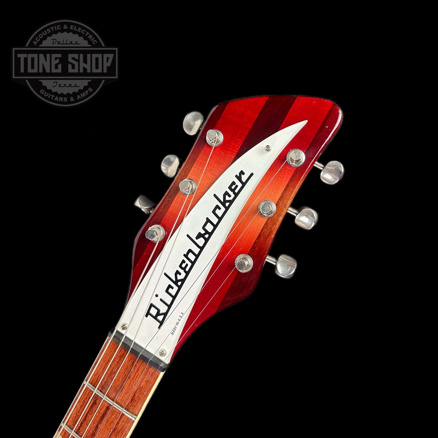 Front of headstock of Used 1997 Rickenbacker 360V64 Fireglow.