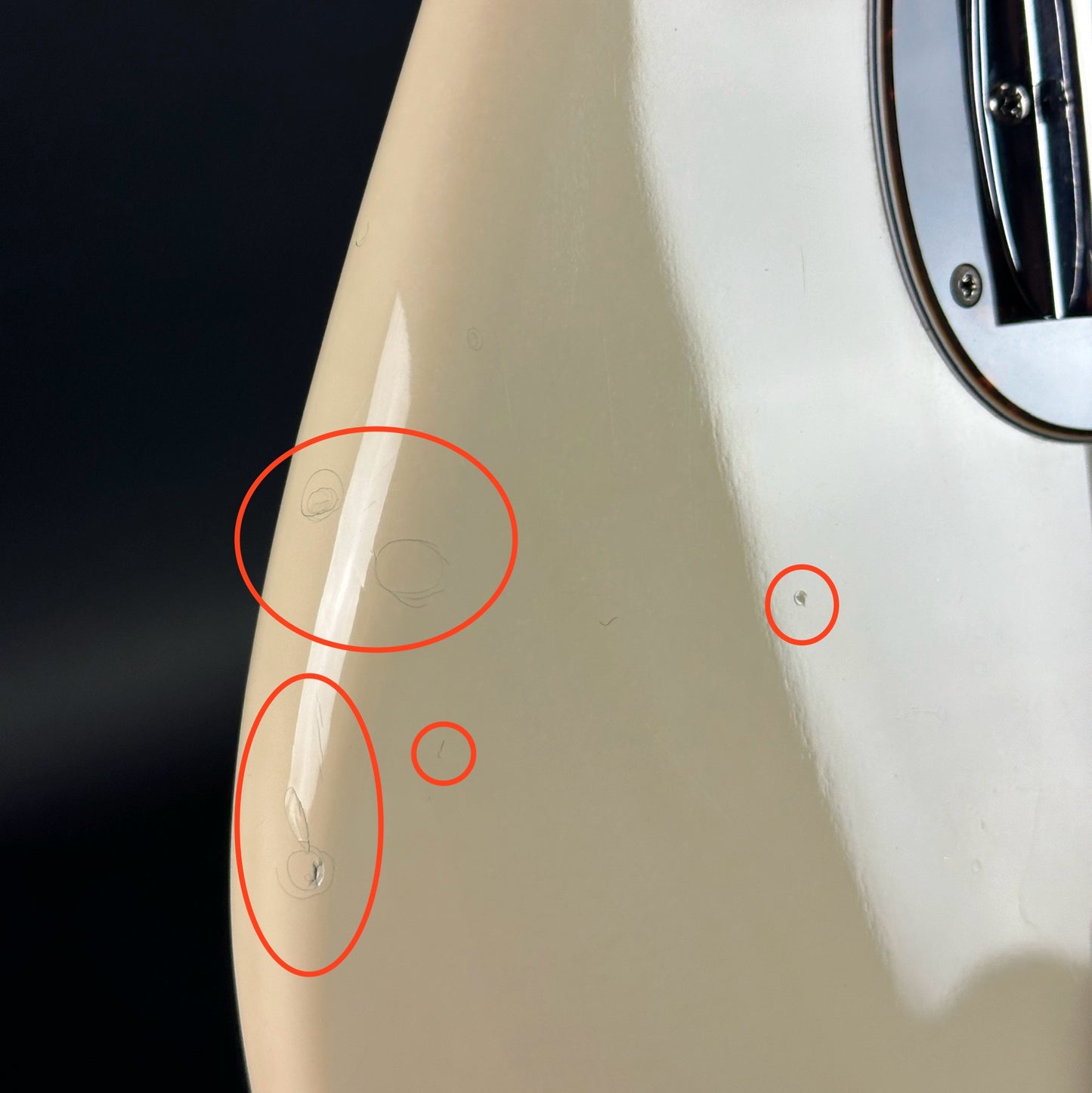 Damage on side of Used Fender CIJ PB-64 Precision Bass Olympic White.