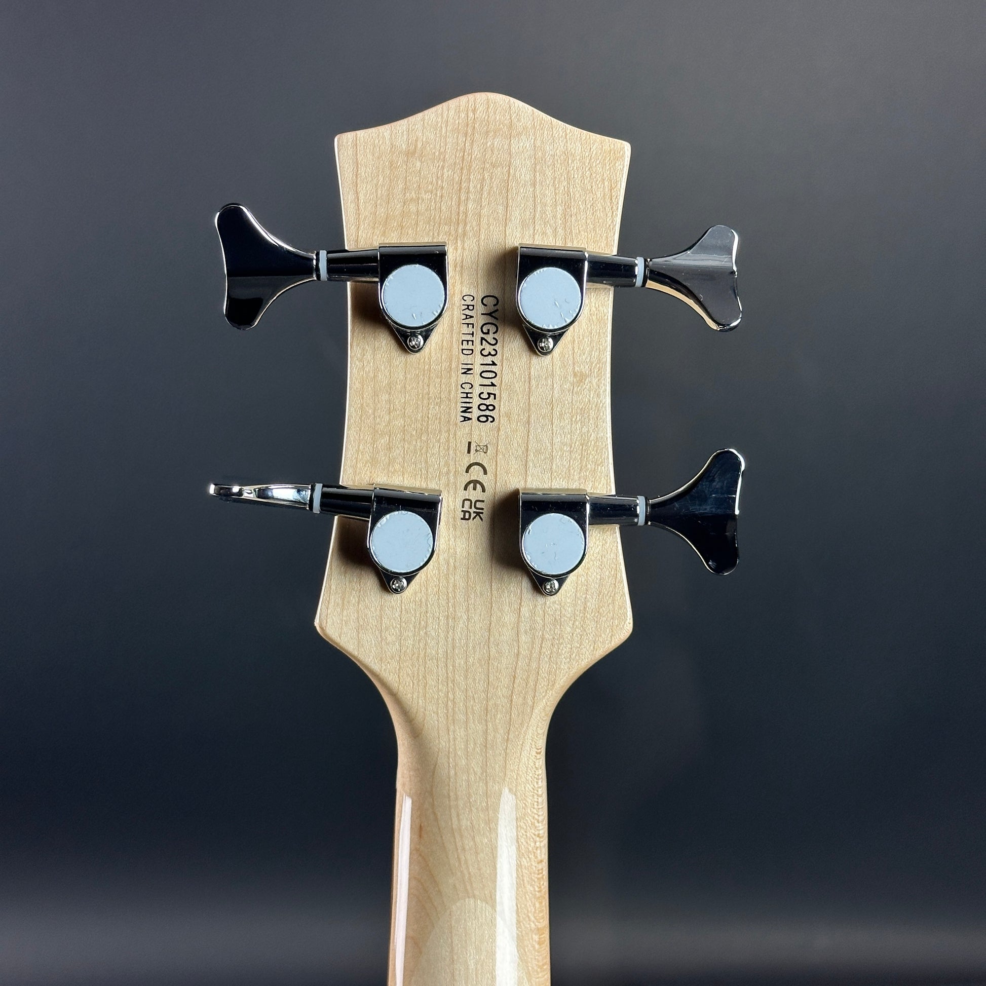 Back of headstock of Used Gretsch G2220 Walnut Stain.